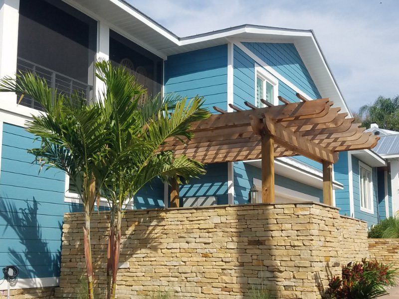 House with Wooden Pergola — Clermont, FL — Florida Dock & Boat Lifts
