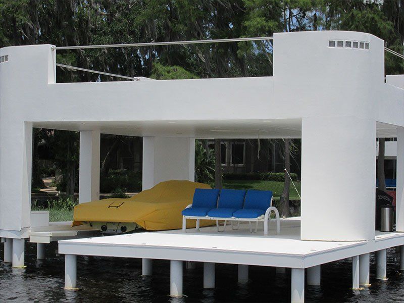 Parked Boat on a Dock — Clermont, FL — Florida Dock & Boat Lifts