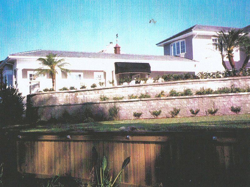Wood Seawall of a House — Clermont, FL — Florida Dock & Boat Lifts