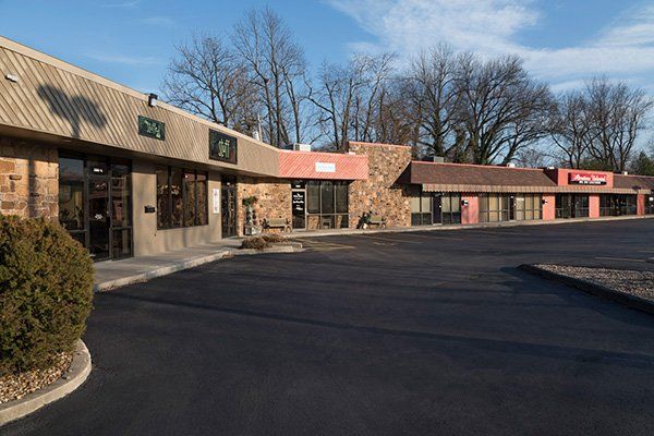 A strip center managed by C. Arch Bay Company.
