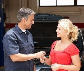 Mechanic Giving Woman Car Keys, Fleet Maintenance in Chesapeake, VA