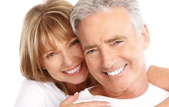 Smiling Couple with White Teeth — Colorado Springs, CO — Smile Heart Dental Hygiene Smiling Couple with White Teeth — Colorado Springs, CO — Smile Heart Dental Hygiene