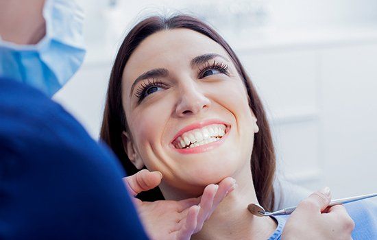 Lady Smiling During Teeth Cleaning — Colorado Springs, CO — Smile Heart Dental Hygiene Lady Smiling During Teeth Cleaning — Colorado Springs, CO — Smile Heart Dental Hygiene