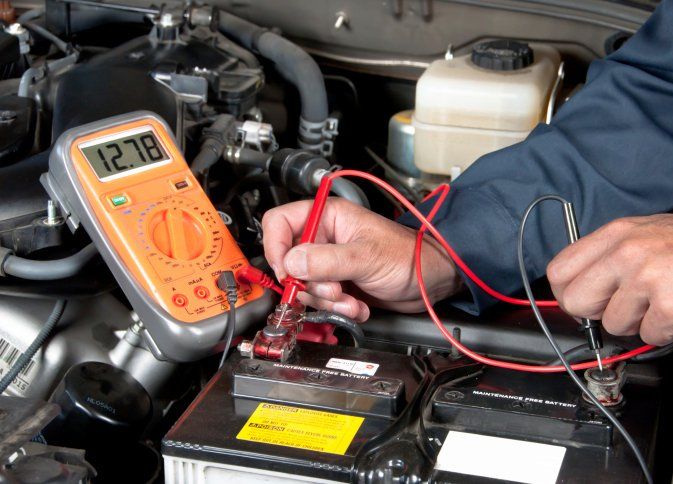Battery testing in our motor repair workshop in Christchurch
