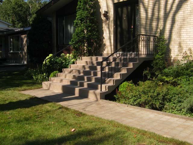 Beautiful house exterior with walkway and stairway