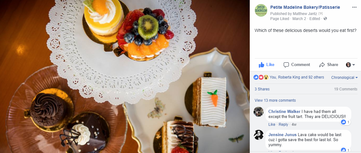 A bunch of desserts on a table next to a facebook post