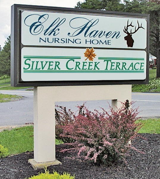 Facility's sign on road