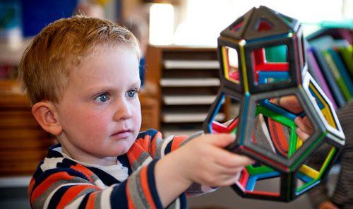 Little kid with his toy