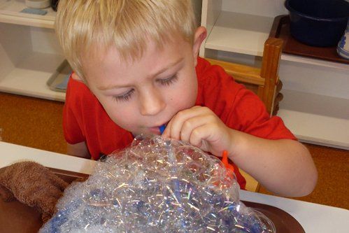 Kid is making bubble