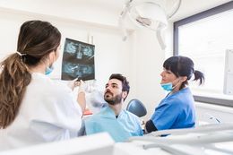 man in dental office chair