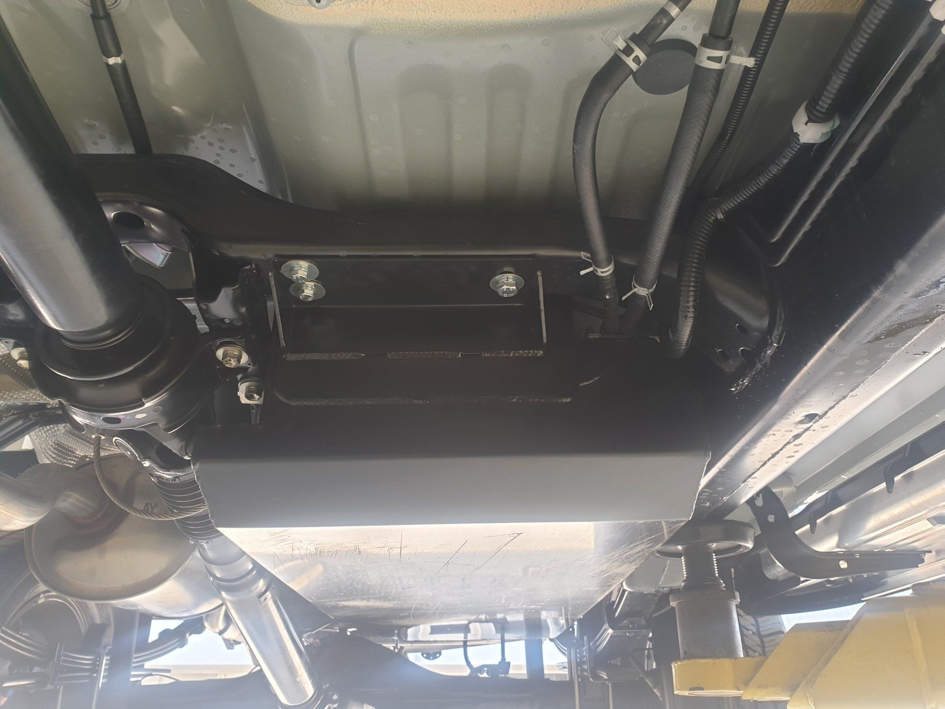 Inspecting the Under Side of a Car - Specialist Mechanics in Cairns, QLD