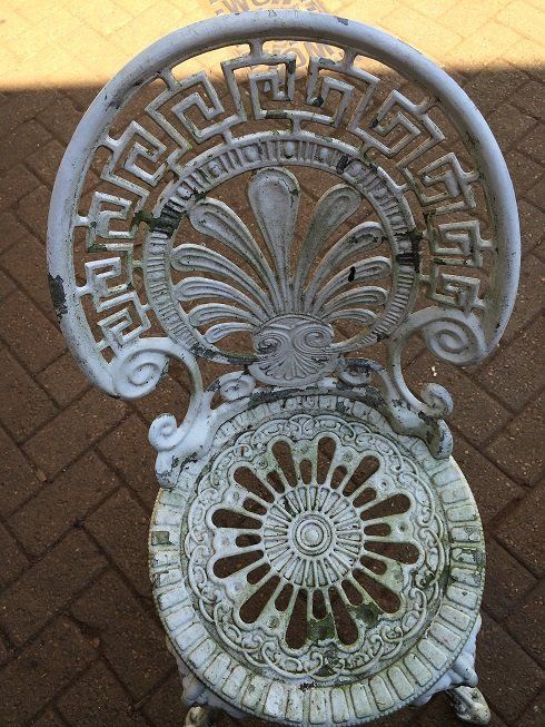 Patio chair prior to re-coating