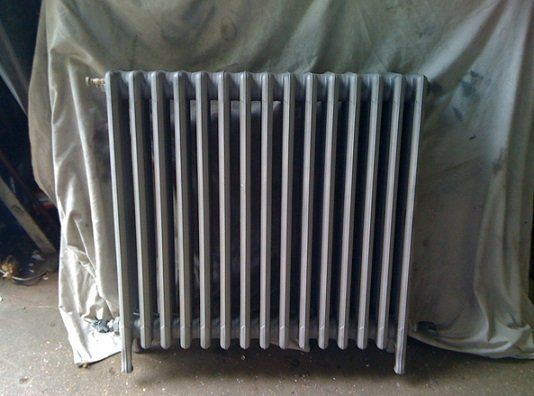 Radiator sand blasting and coated