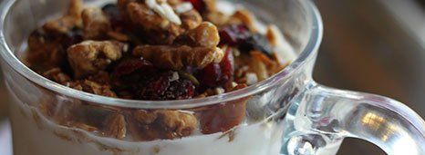 Yogurt parfait with seasonal fruit and granola
