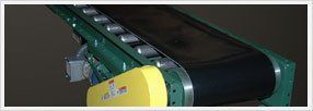 Bed Conveyors — Green Roller Bed Conveyors In Shipping Area In Fort Worth, Tx Bed Conveyors — Green Roller Bed Conveyors In Shipping Area In Fort Worth, Tx