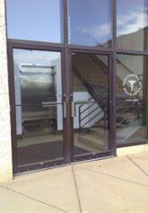 Doors to Company Female Doctor — Massage Therapy in Edina, MN