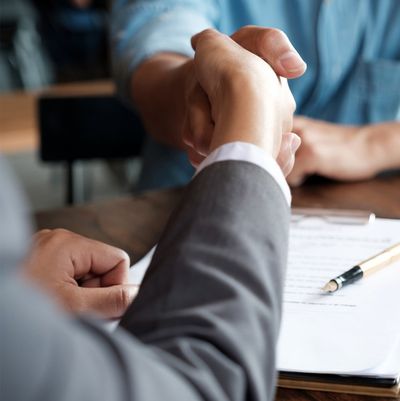 Attorney Shaking Hands with a Client — Ormond Beach, FL — Korey Sweet McKinnon & Simpson