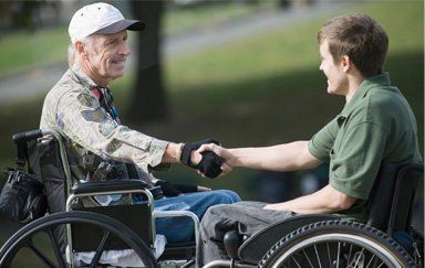 Veteran shaking hands - Veteran's Benefits in Burlington, VT Veteran shaking hands - Veteran's Benefits in Burlington, VT