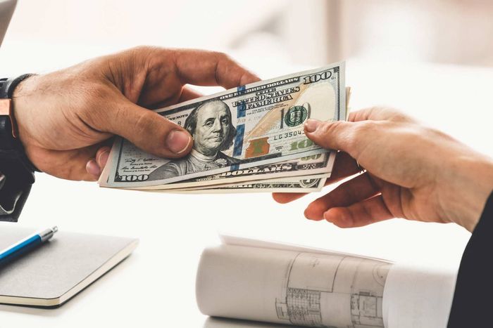 Handing Money — Cheyenne, WY — Rocky Mountain Pawn