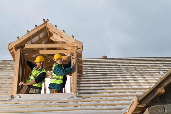 Construction workers in house - residential roofing in Clay Center, KS Construction workers in house - residential roofing in Clay Center, KS