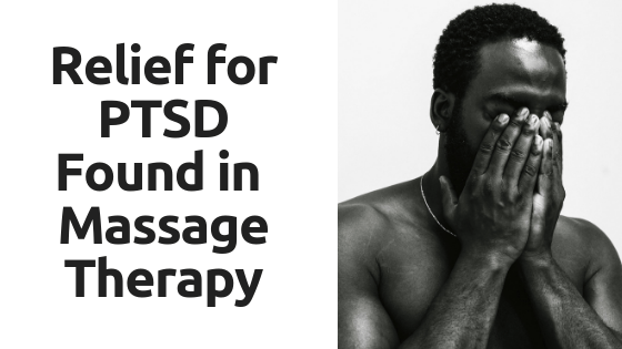 A man covering his face with his hands next to a sign that says relief for ptsd found in massage therapy