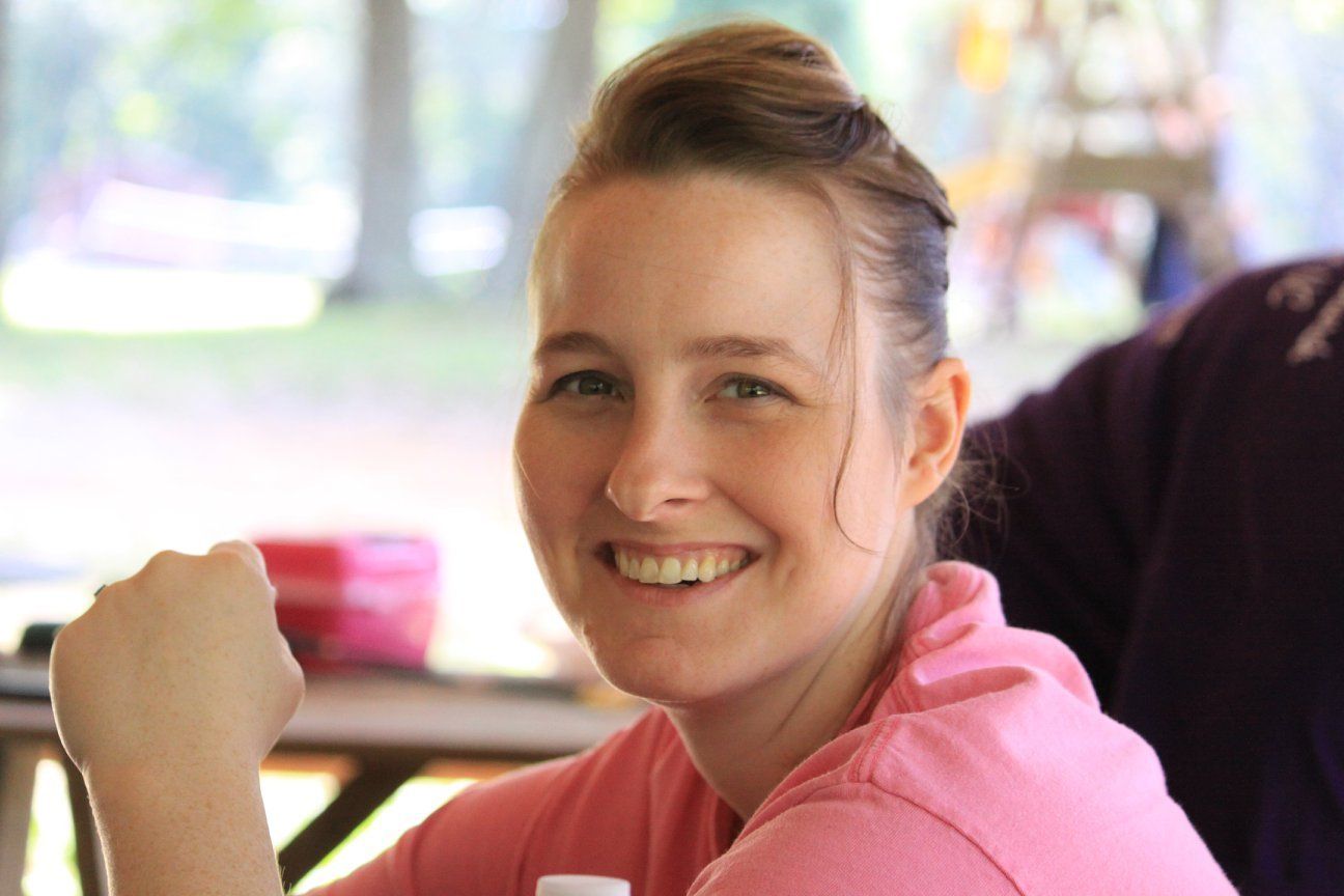 Member smiling.