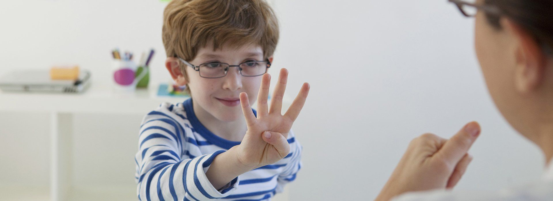 Boy learning to count