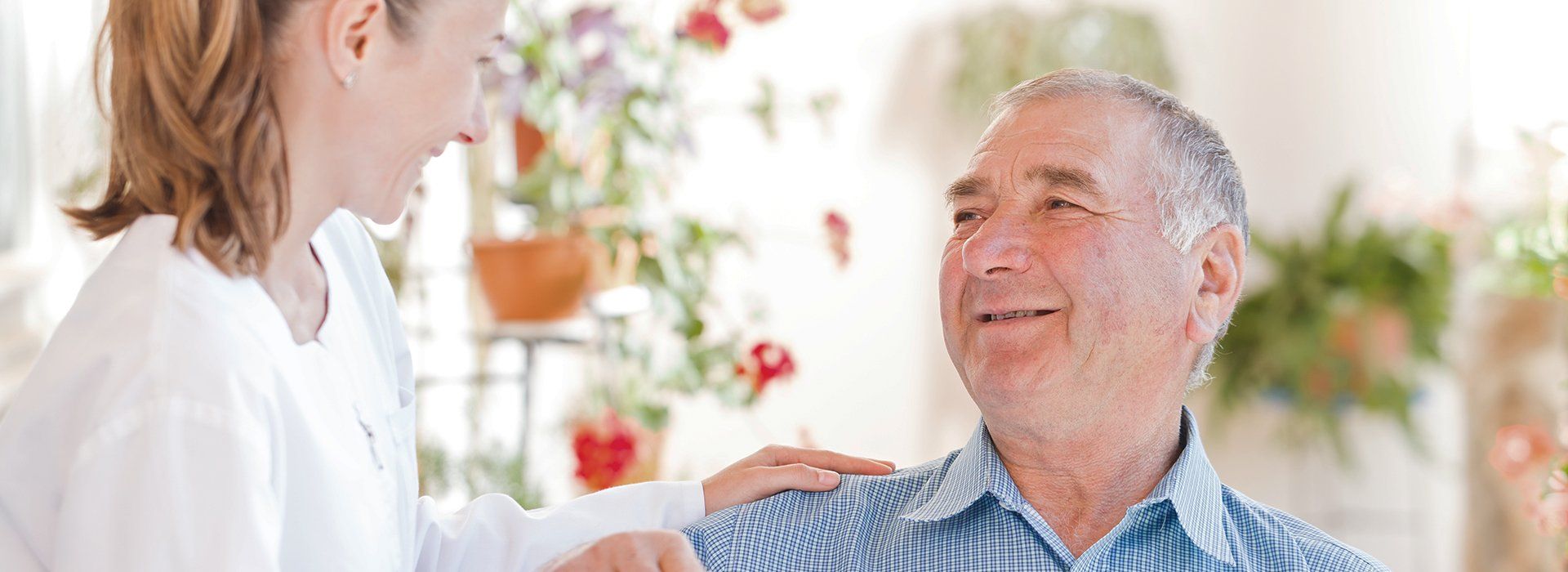 Nurse taking care of an elderly man