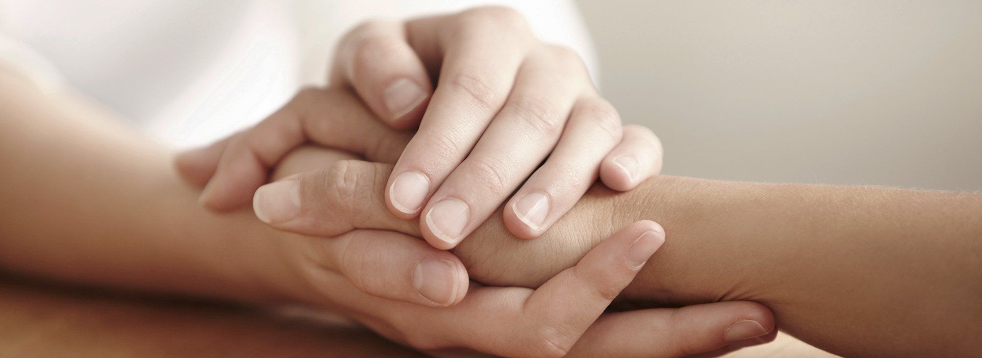 Holding hands reassuringly