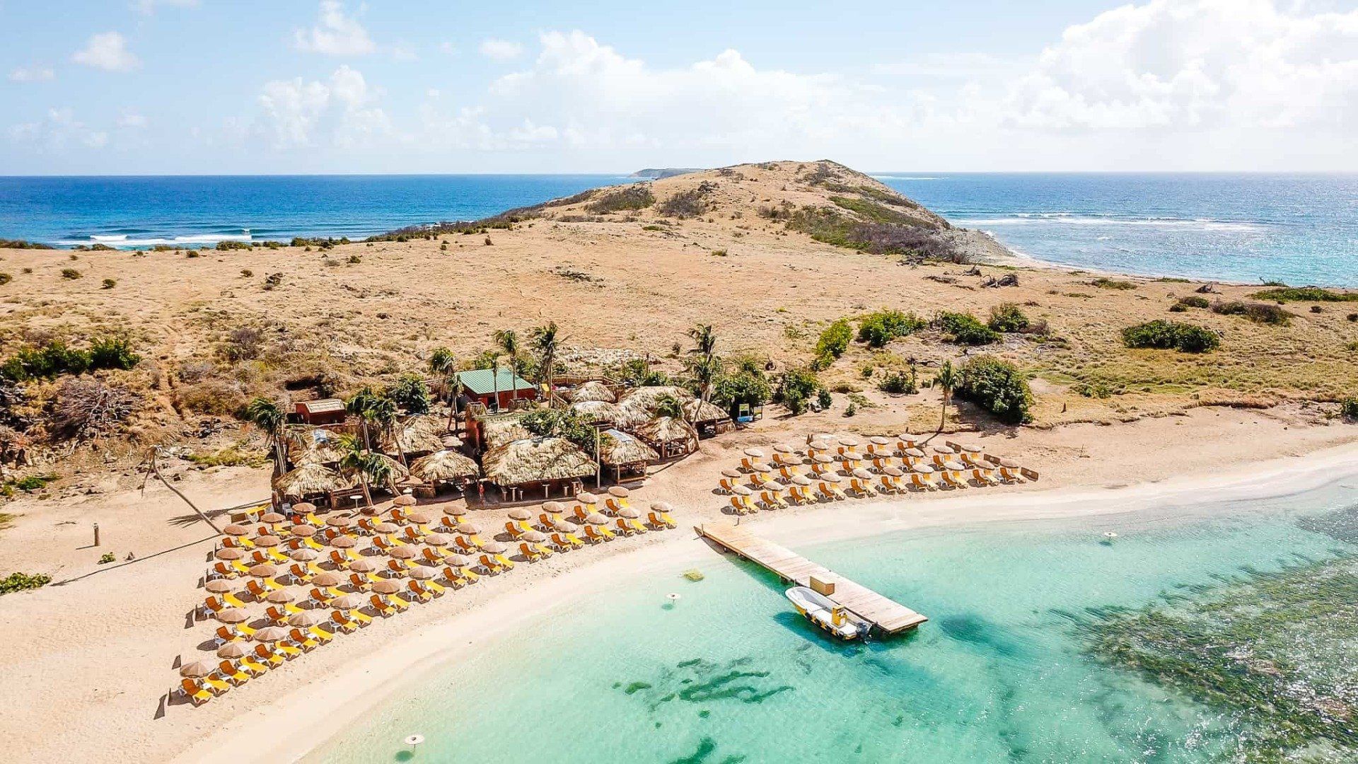The Yellow Beach restaurant on Pinel Island from the air !