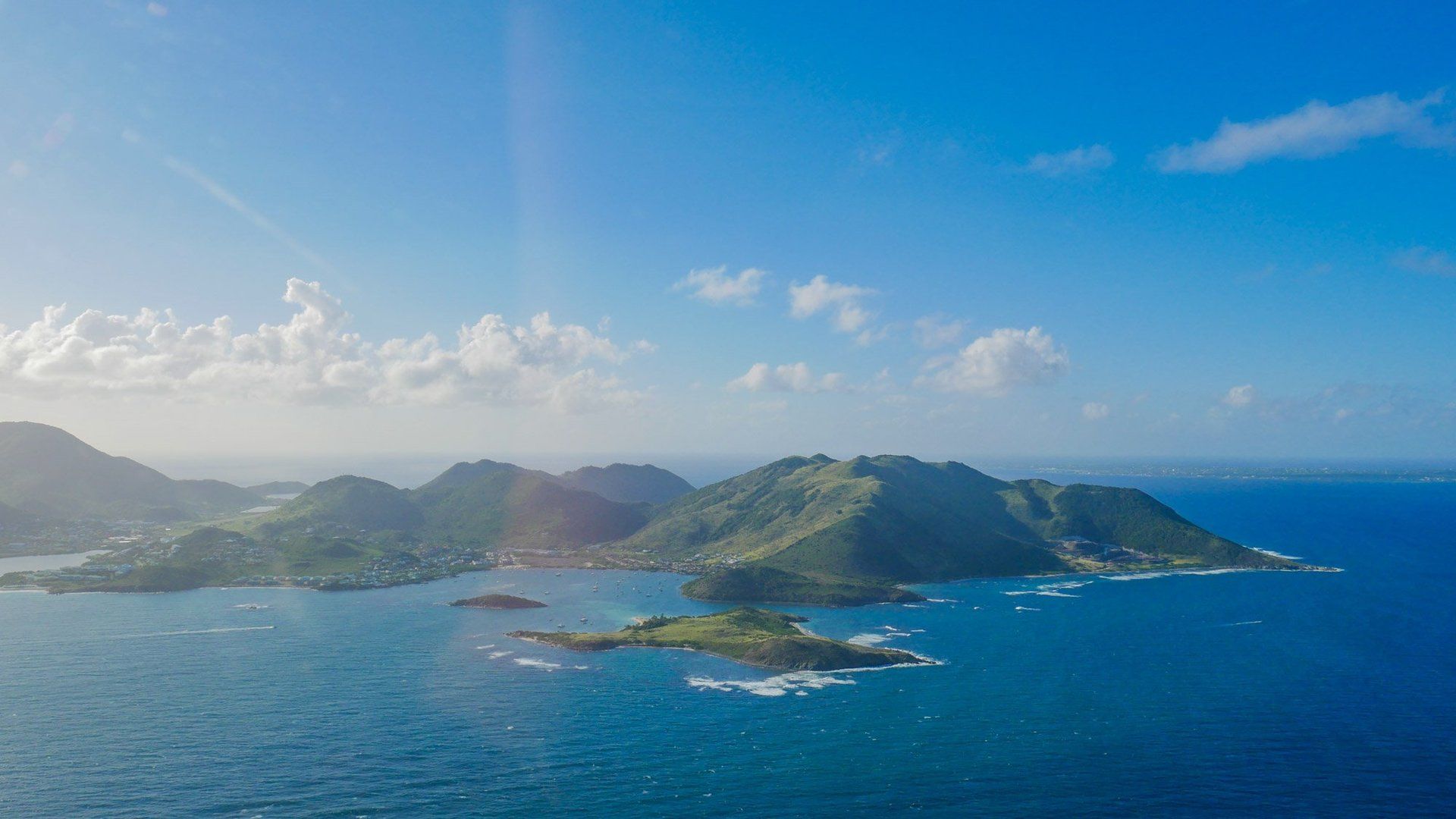 An aerial view of a group of islands in the middle of the ocean.