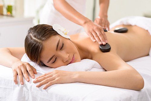 Hot stone therapy in progress