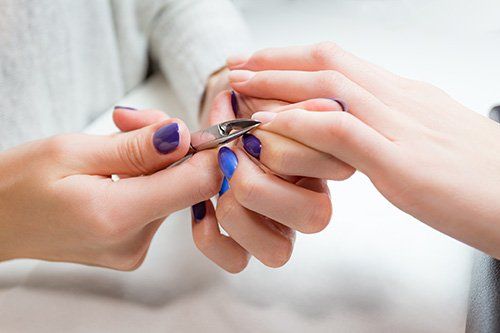 Manicure by professional in progress