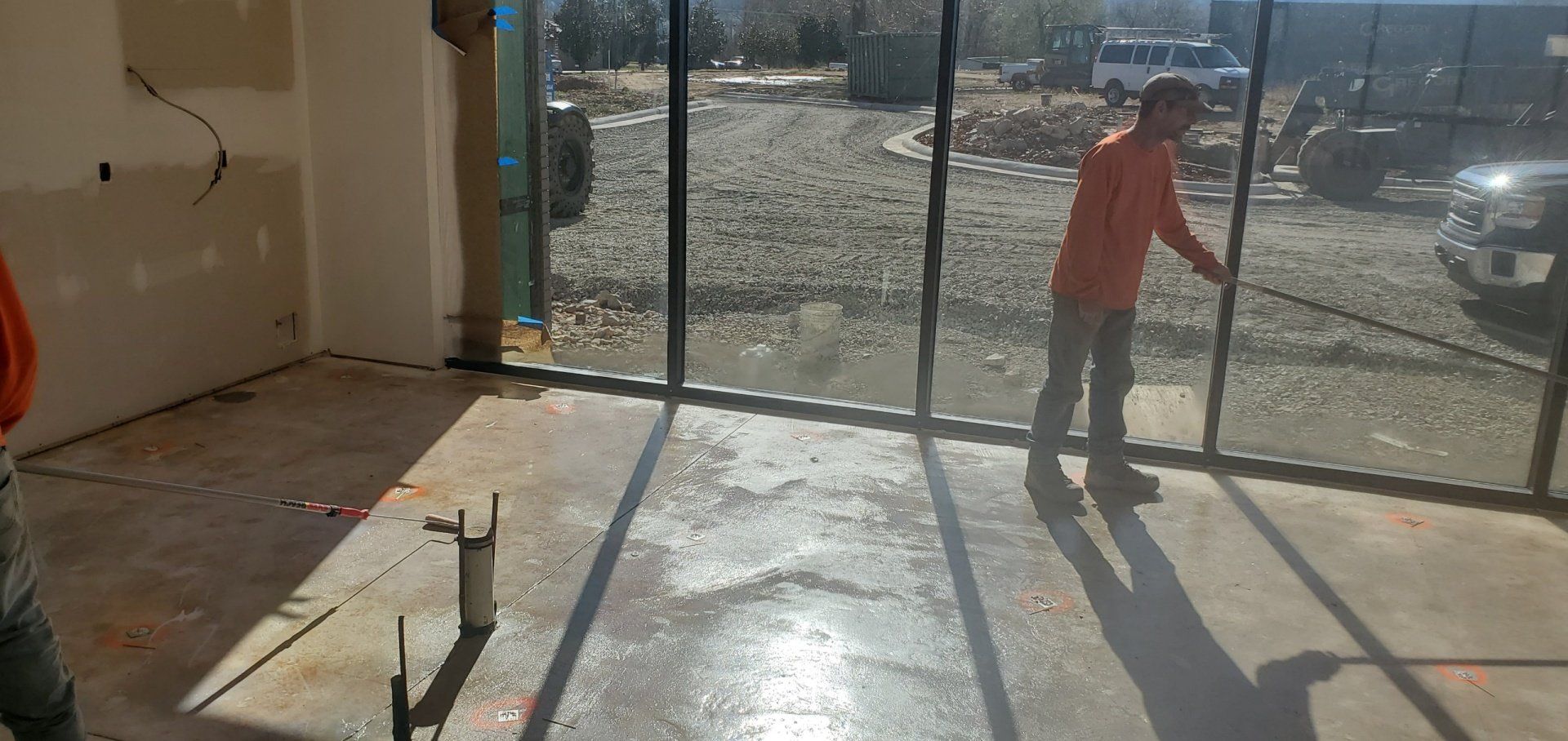 Man Working On Floors — Muldrow, OK — Gypsum Floors of AR/OK, Inc