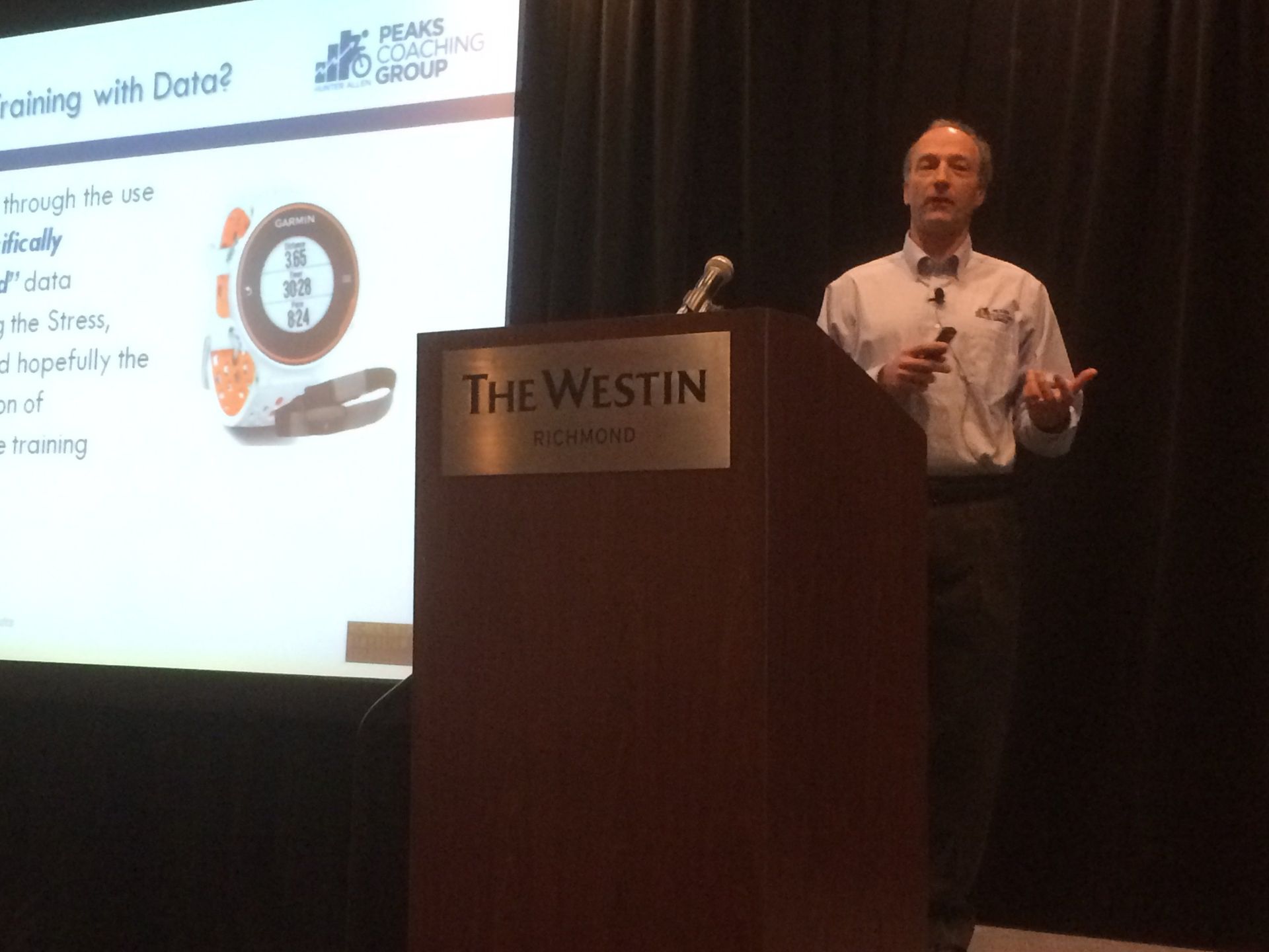 A man is giving a presentation at the westin hotel