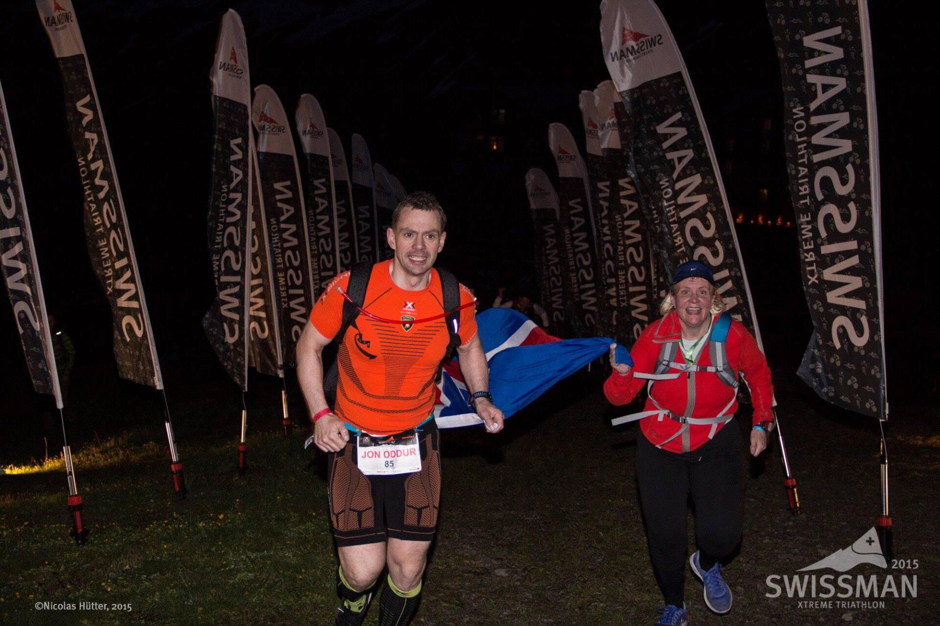 A man and a woman are running in a race.