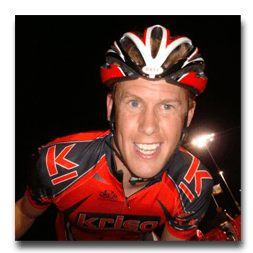 A man wearing a helmet and a shirt that says crisis