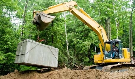 Installing septic tank — Septic Tank Service in Manchester, NH Installing septic tank — Septic Tank Service in Manchester, NH