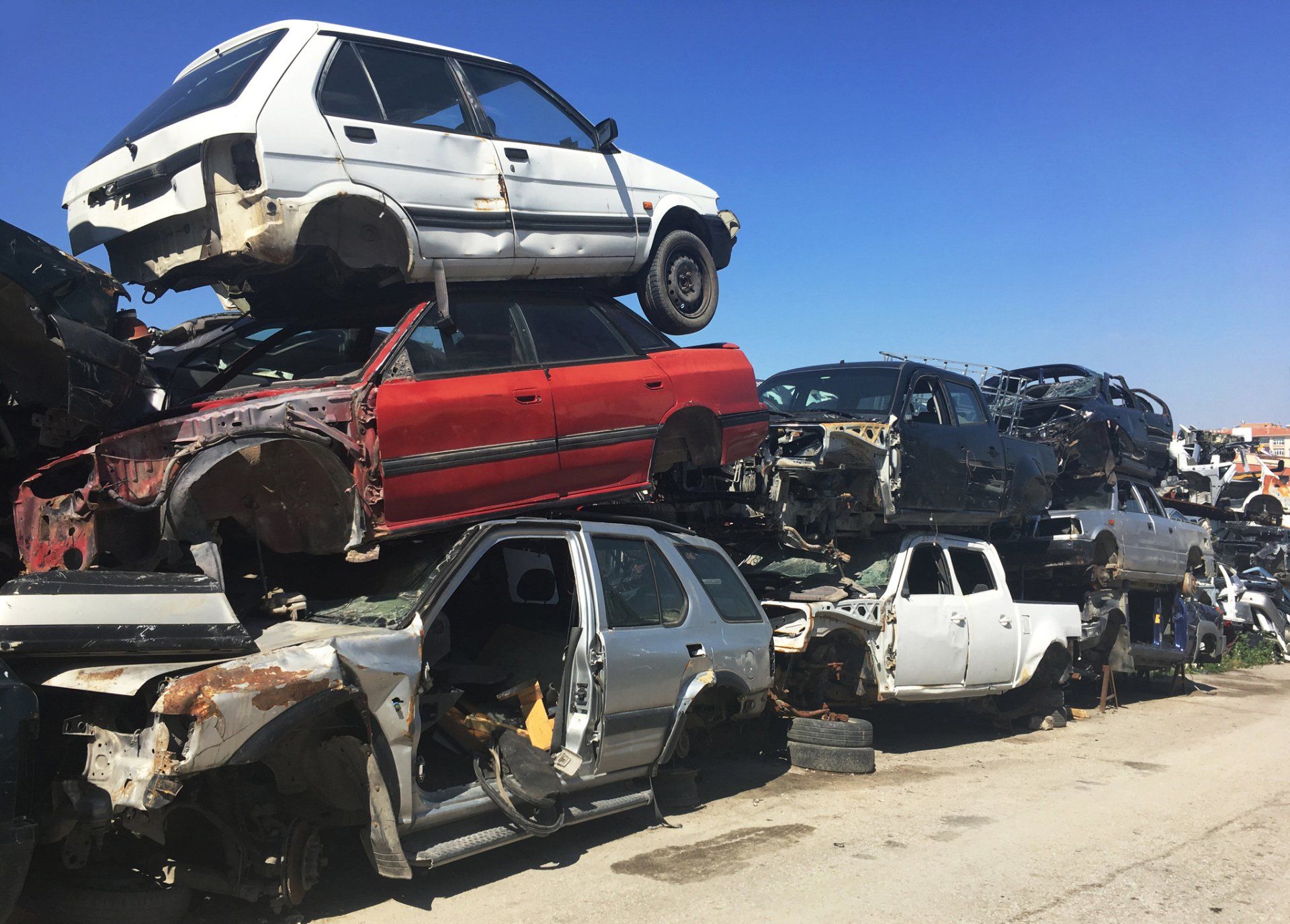 Old Cars Stacked on the Junkyard — Chicago, IL — Cash For Cars Old Cars Stacked on the Junkyard — Chicago, IL — Cash For Cars