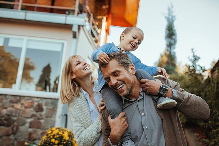 Man and family smiling
