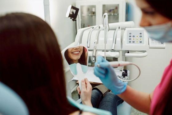 dental patient checking herself