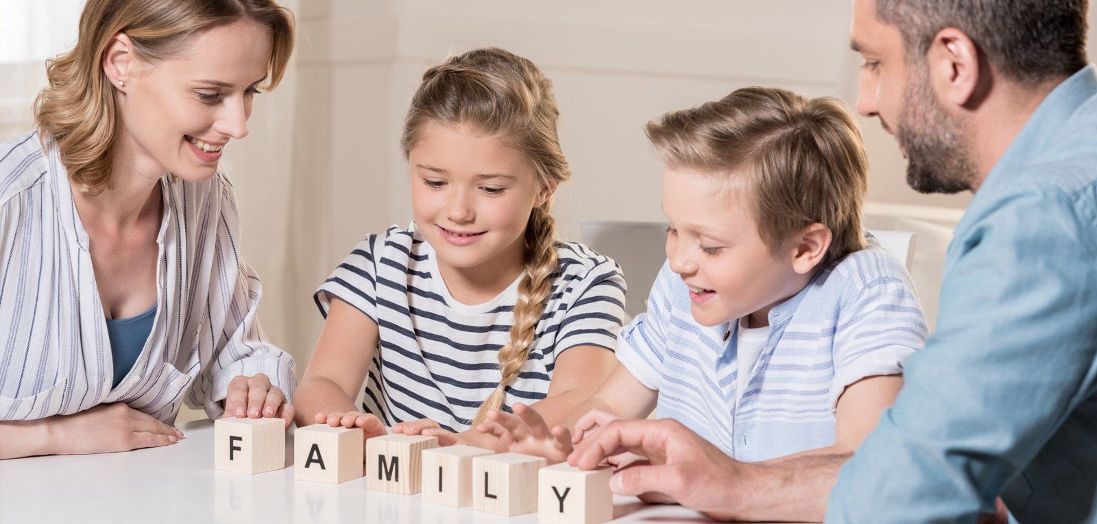 happy family playing with blocks 