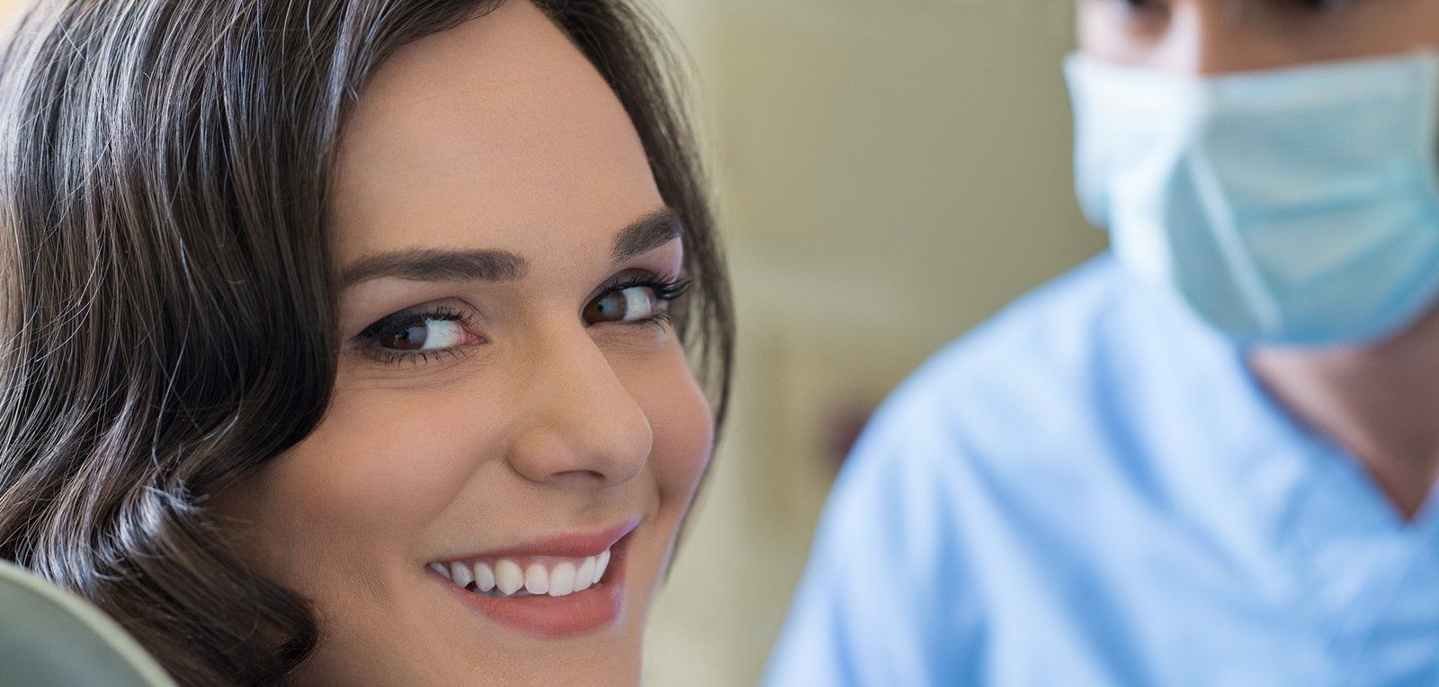 A smiling lady with dentist