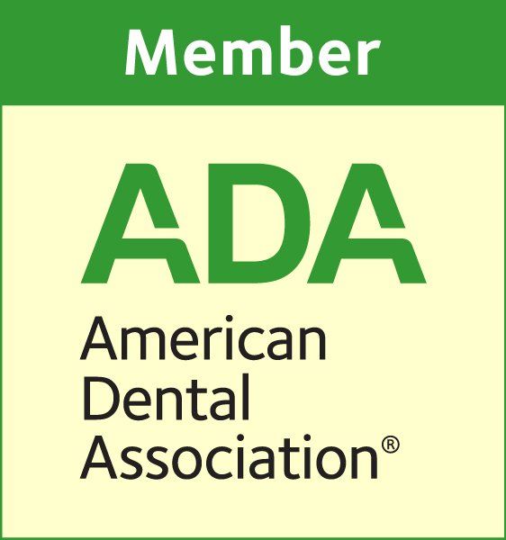 ADA American Dental Association member logo in green and white