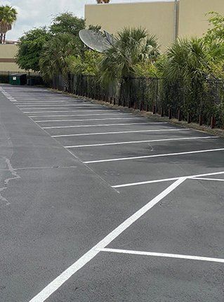 Seal Coating - Newly Coated Road in Jacksonville, FL Seal Coating - Newly Coated Road in Jacksonville, FL