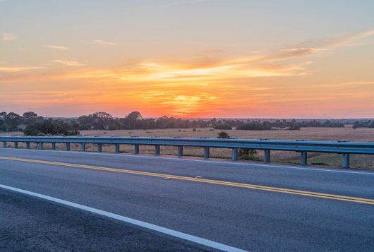 Seal Coating -A Rural Road Through Central Florida in Jacksonville, FL Seal Coating - A Rural Road Through Central Florida in Jacksonville, FL