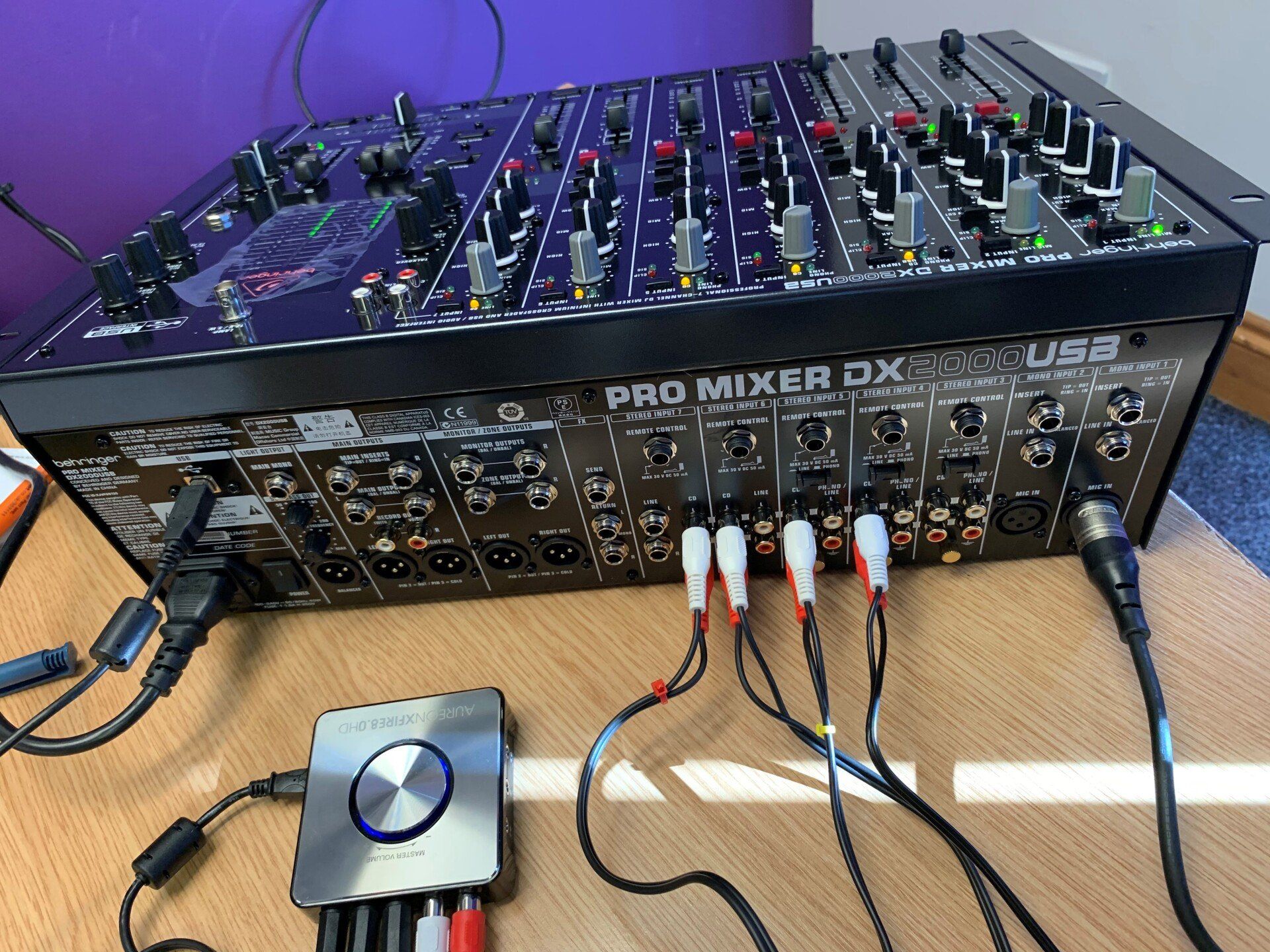 A pro mixer dx is sitting on a wooden table