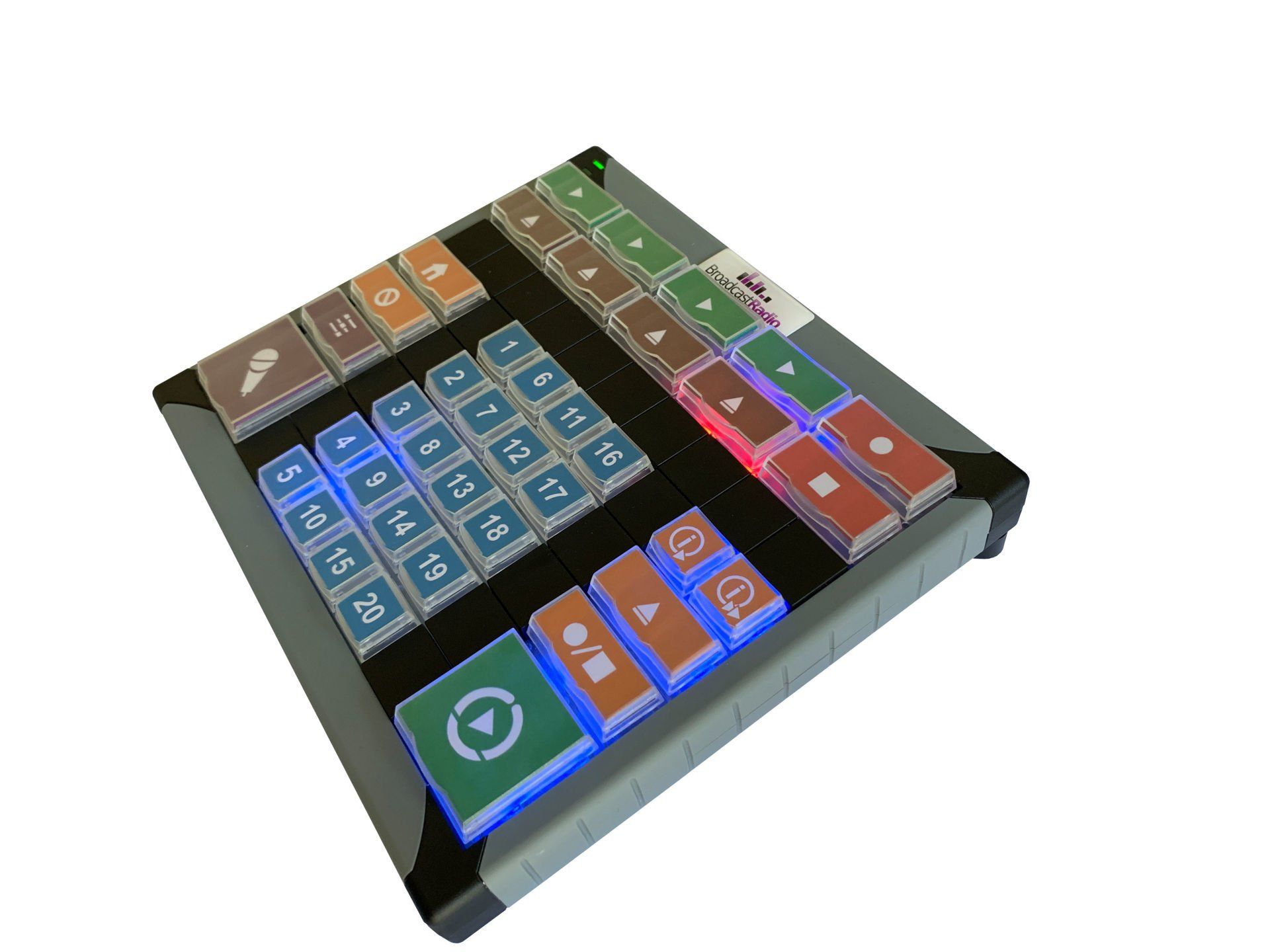 A keyboard with a lot of buttons on it is sitting on a table.
