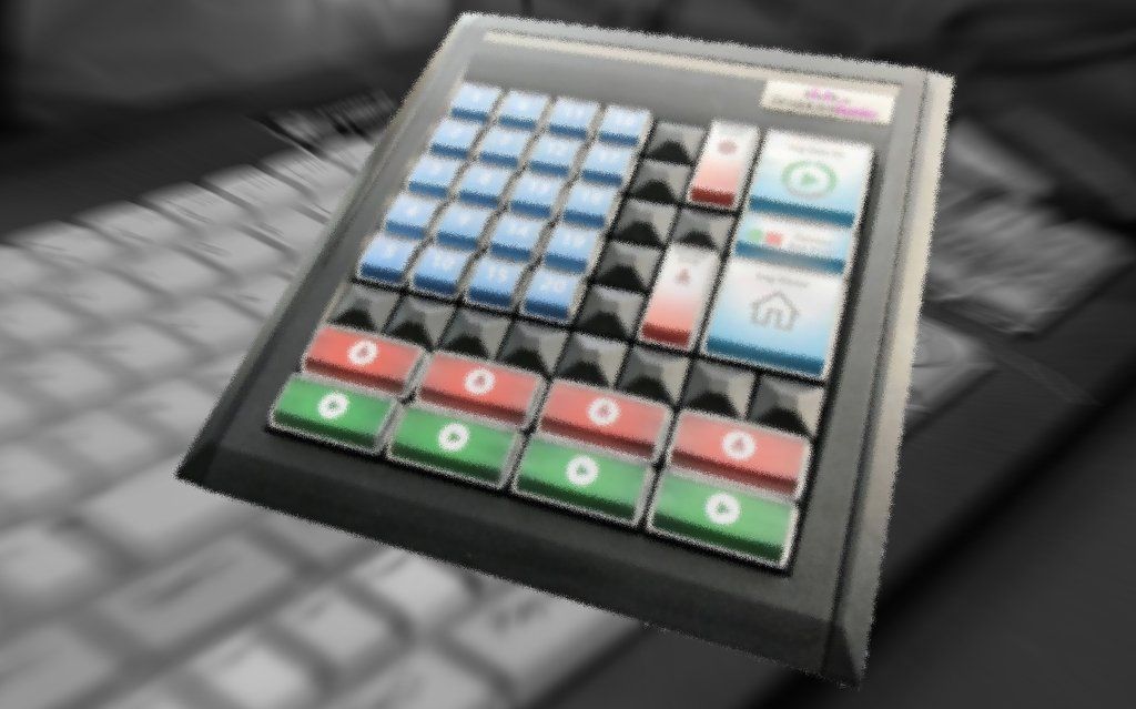 A black keyboard with a bunch of buttons on it