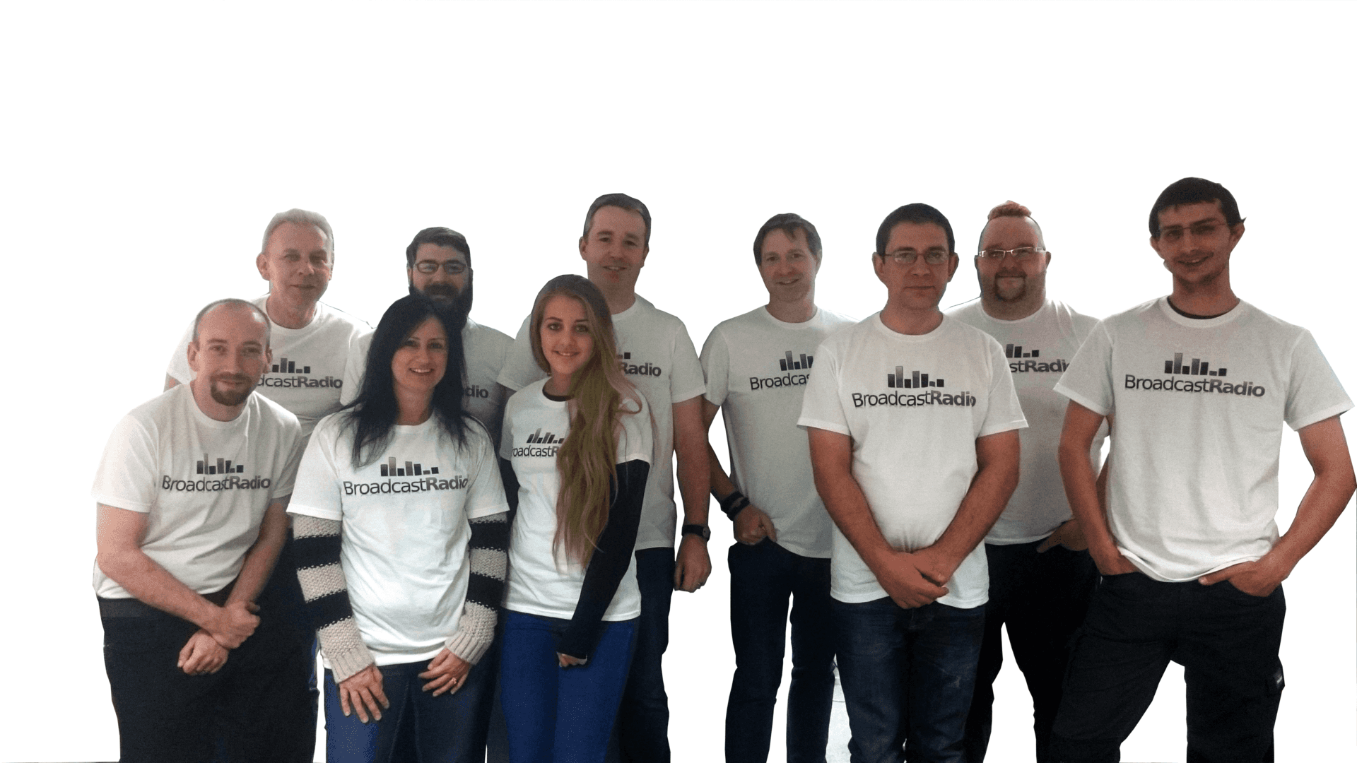 A group of people wearing white shirts are posing for a picture.